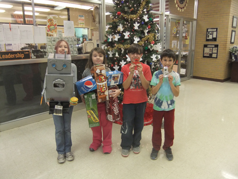 Mrs. Quinn's  Second Grade  students made robots last week .  The Students read the story   